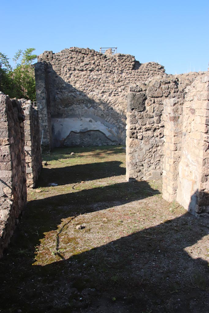 VIII.5.16 Pompeii. October 2022. 
Looking west towards west wall of room 1, large triclinium. Photo courtesy of Klaus Heese. 
