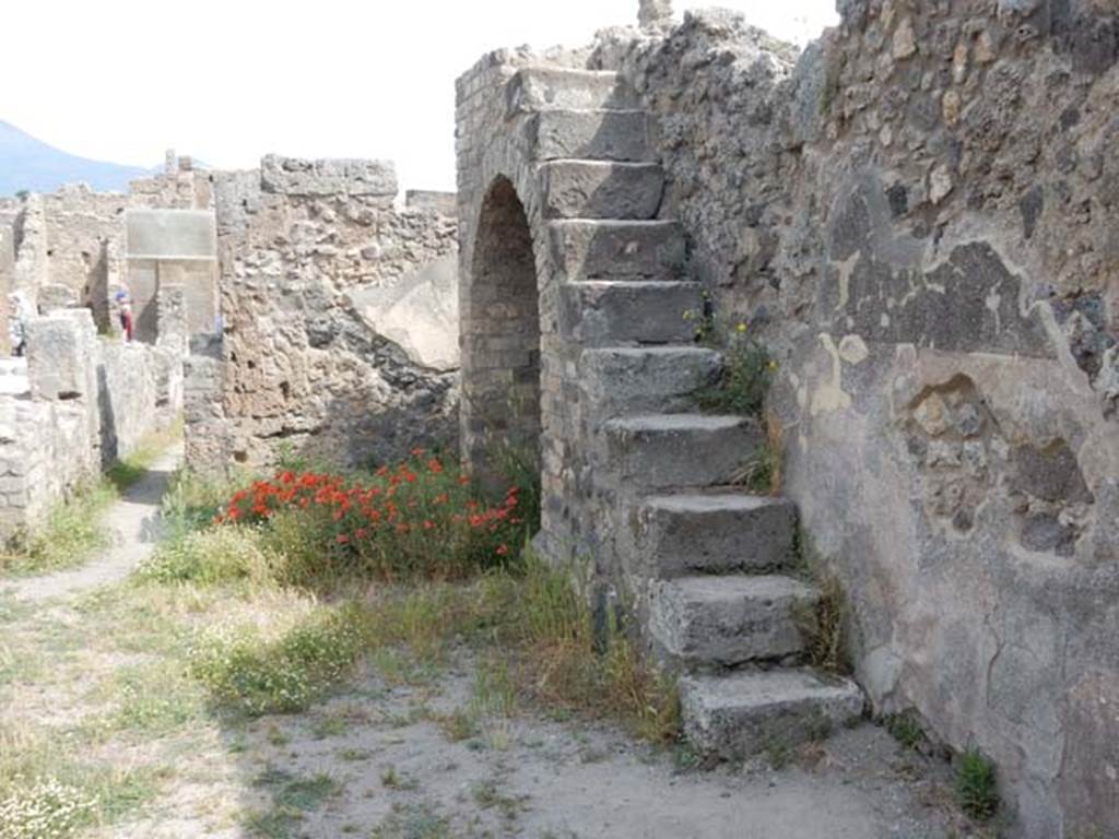 VIII.5.17 Pompeii. May 2017. Recess with stairs to upper floor. Looking north along east wall. Photo courtesy of Buzz Ferebee.
