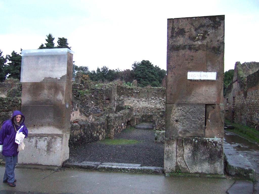 VIII.5.19 Pompeii. December 2005. Entrance with graffiti on east pilaster.