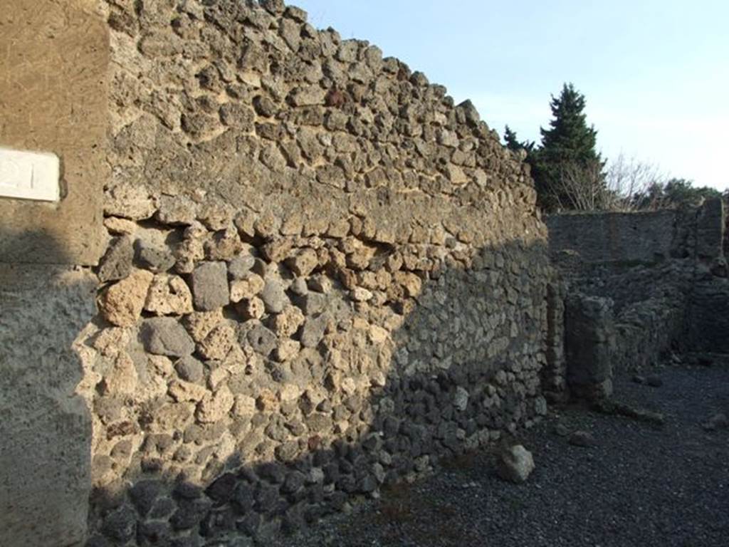 VIII.5.21 Pompeii.  Shop and room.  December 2007. East wall of shop and rear room.