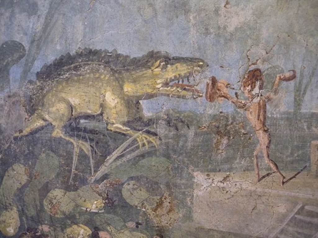 VIII.5.24 Pompeii. Detail from a wall painting of Pygmies in a Nile Scene. From a low wall connecting peristyle columns in VIII.5.24.  
Now in Naples Archaeological Museum. Inventory number 113195.
