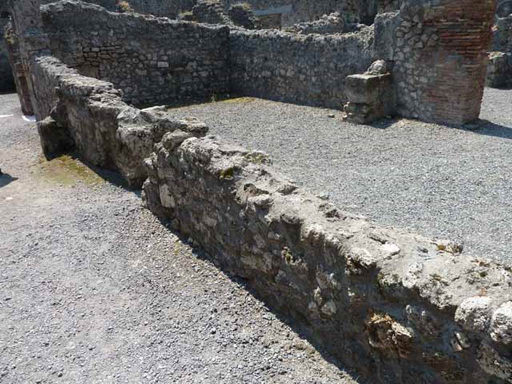 VIII.5.24 Pompeii. May 2010. Entrance corridor, remains of west wall, looking over wall with VII.5.23.