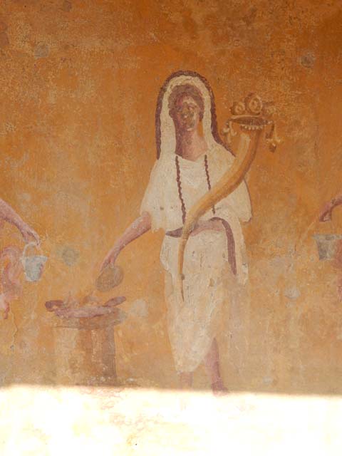 VIII.5.37 Pompeii. May 2017. Room 1, Genius making an offering, detail from lararium painting, after restoration.  Photo courtesy of Buzz Ferebee.
