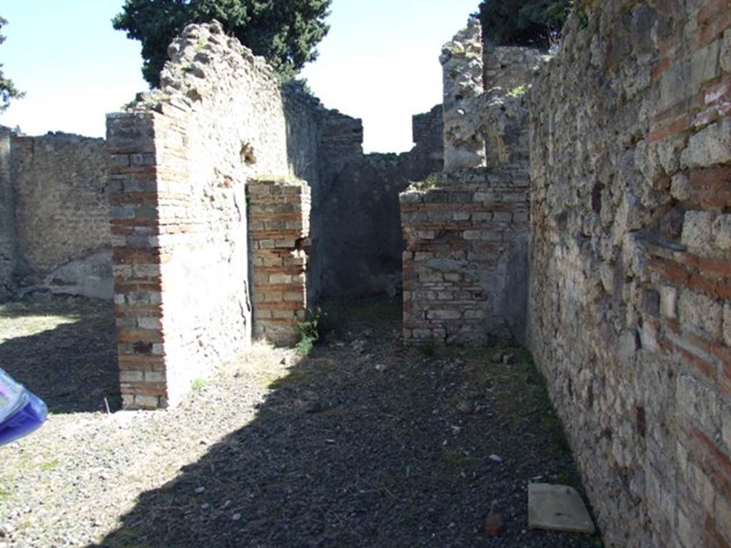 VIII.5.37 Pompeii.  March 2009. Room 6, Corridor. Looking east to Doorway to Room 7, Cubiculum.
