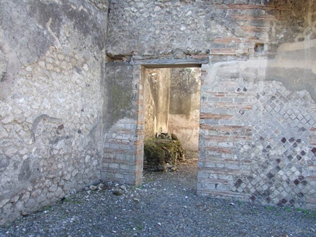 VIII.5.37 Pompeii.  March 2009. Doorway to Room 15. Kitchen, in south west corner of atrium.