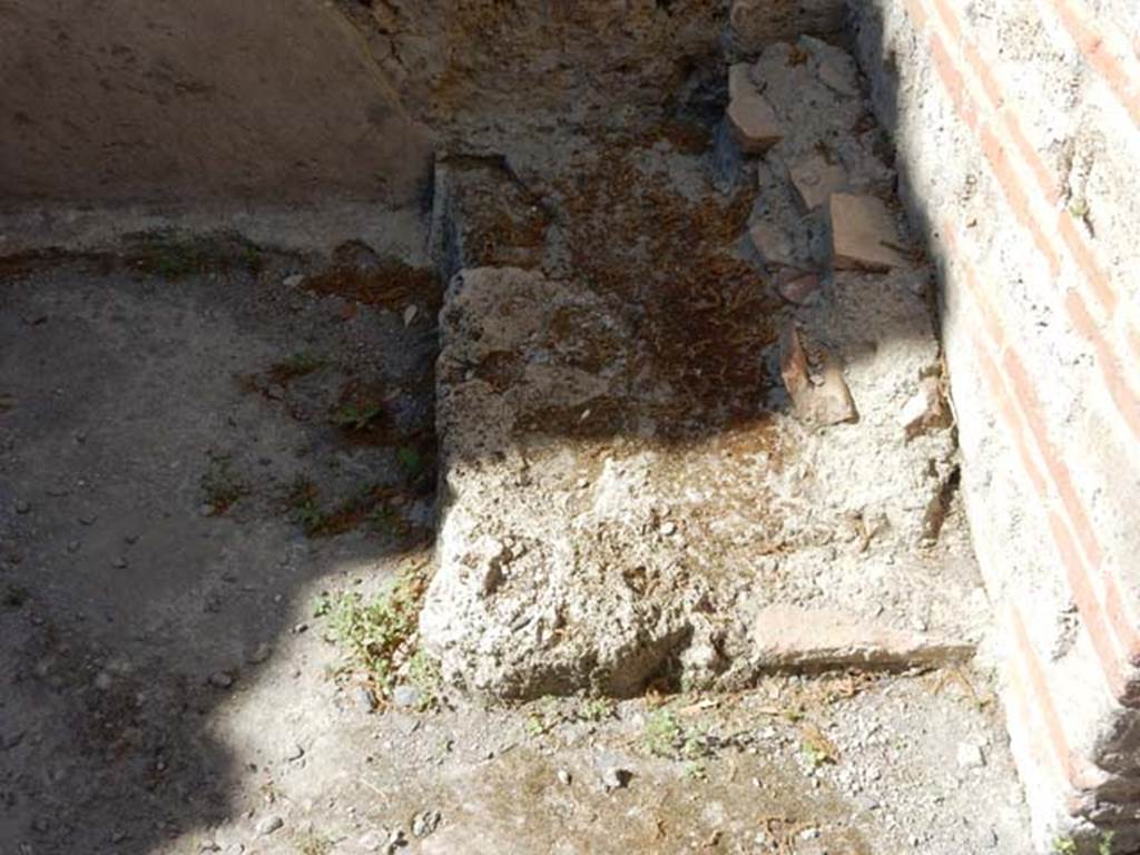 VIII.5.37 Pompeii. May 2017. Room 15, looking north to base of stairs in north-east corner of kitchen. Photo courtesy of Buzz Ferebee.
