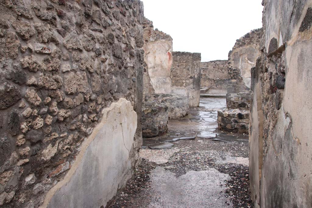 VIII.6.1 Pompeii. October 2020. Looking north along entrance corridor and across bakery room. Photo courtesy of Klaus Heese.