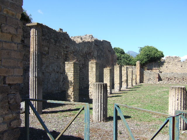 VIII.6.2, Pompeii. September 2005. Looking north along portico on west side.