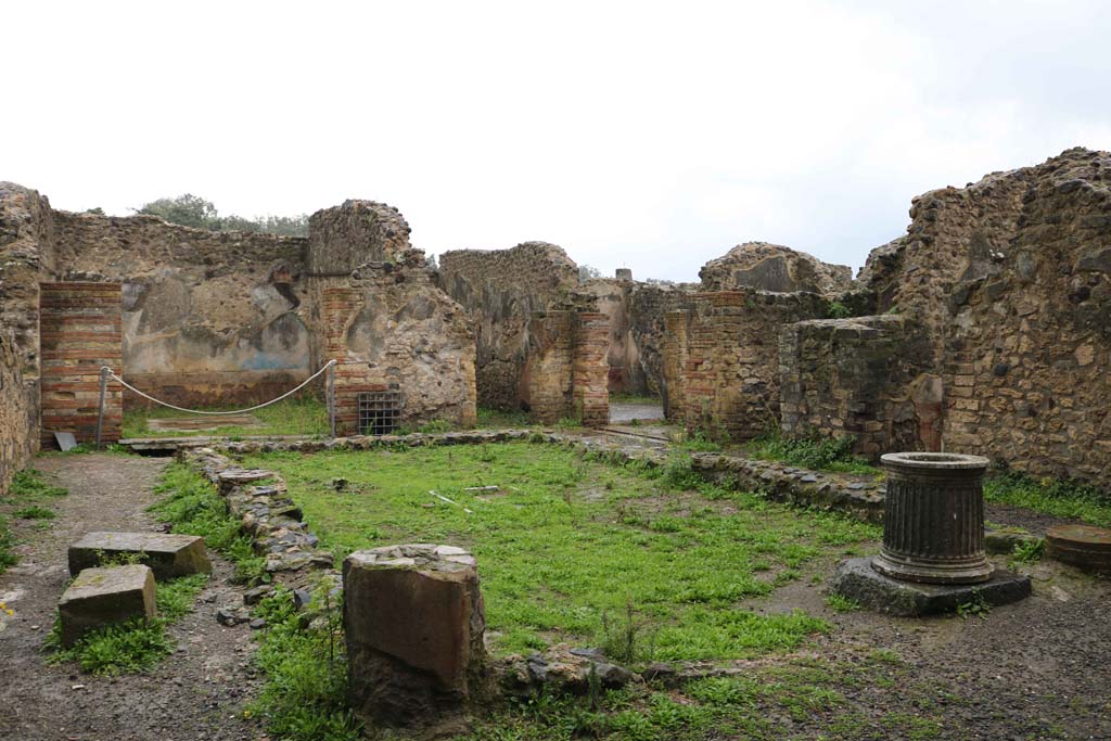VIII.6.1, Pompeii. December 2018. 
Looking east across peristyle towards the doorway to a triclinium and a storeroom. Photo courtesy of Aude Durand.
