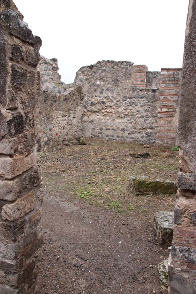 VIII.6.11 Pompeii. October 2020. Looking south through doorway to room on south side of entrance, according to Eschebach – a stable?. 
Photo courtesy of Klaus Heese
