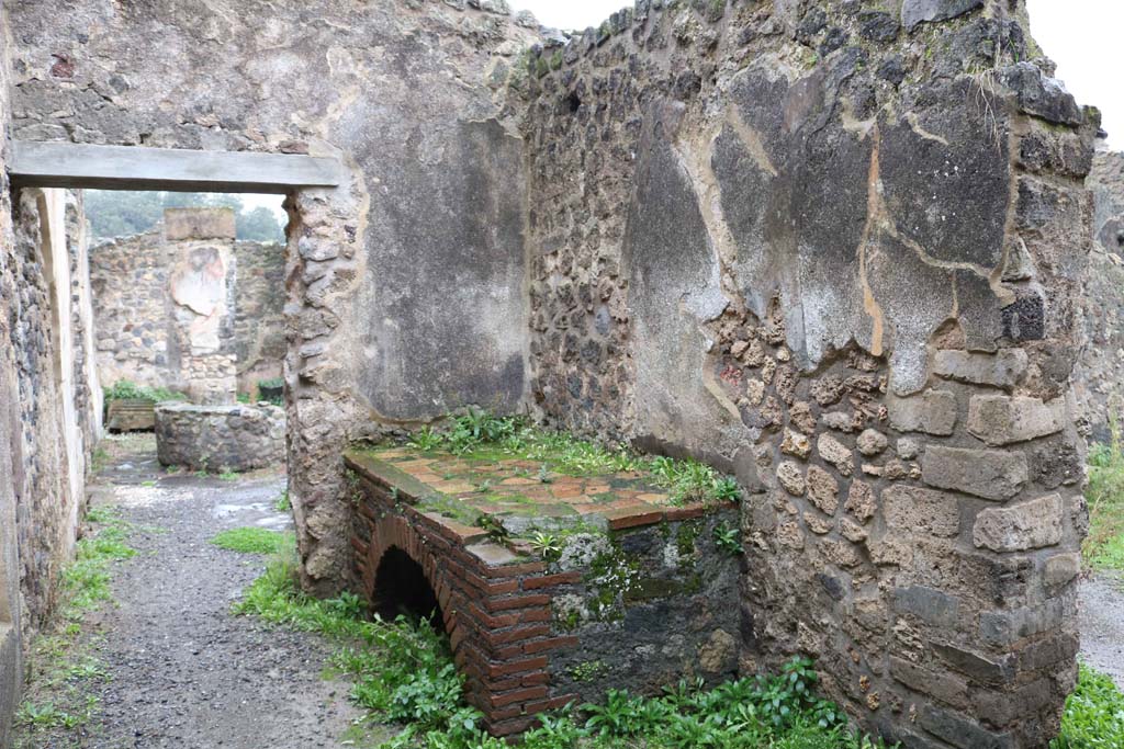 VIII.6.11, Pompeii. December 2018. Looking east in kitchen towards bakery room. Photo courtesy of Aude Durand.