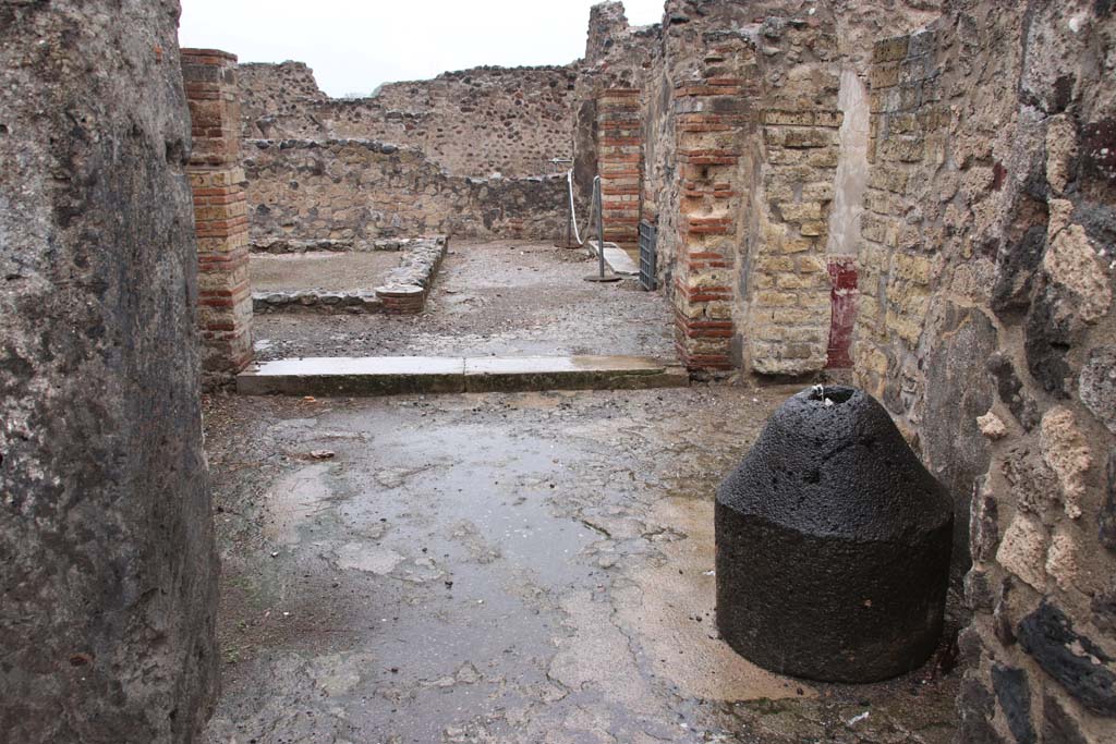 VIII.6.11 Pompeii. October 2020. Looking north through doorway from bakery room across room K, towards rooms around peristyle. 
Photo courtesy of Klaus Heese
