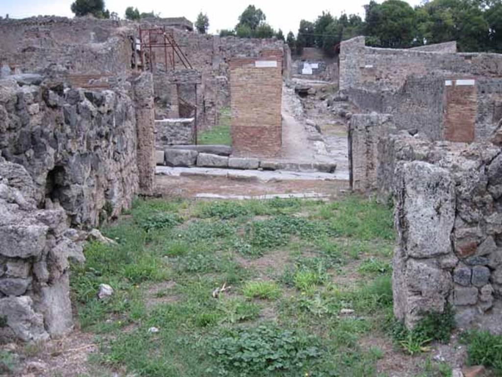 VIII.7.11 Pompeii. September 2010.  Looking east from rear room across shop, to entrance on Via Stabiana. Photo courtesy of Drew Baker.
