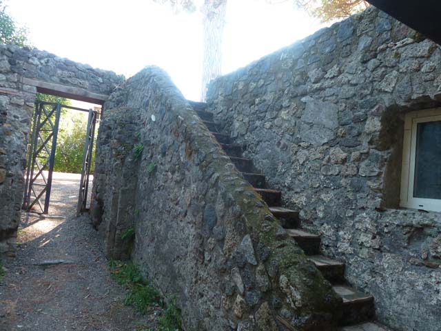 VIII.7.16 Pompeii. September 2015. Staircase to upper floor in room on the south side.