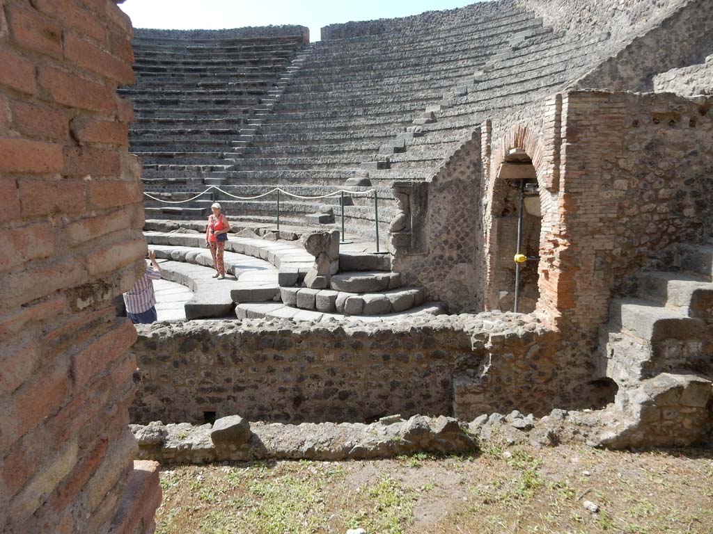 VIII.7.19 Pompeii. June 2019. 
Small narrow steps leading to seating for the honoured guests, looking towards east side of Little Theatre. 
Photo courtesy of Buzz Ferebee.

