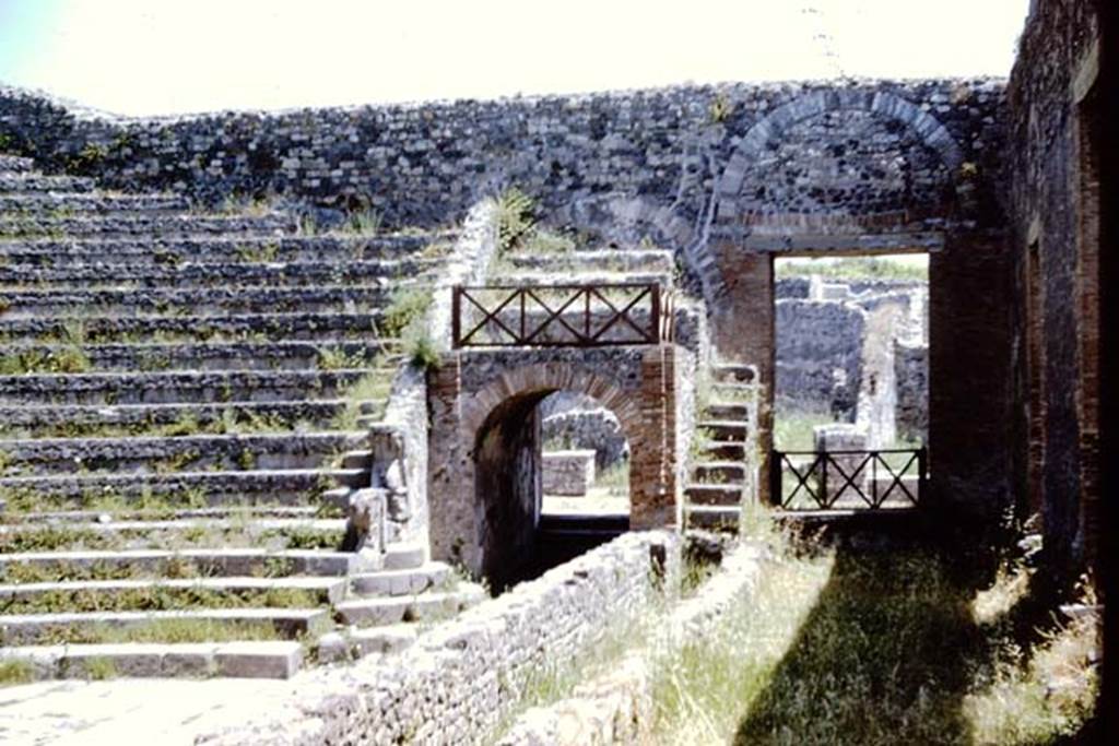 VIII.7.18 Pompeii. May 2006. Site of stage, looking east.
Looking east towards entrance from corridor, along site of stage, towards Tribunal over arched entrance.
