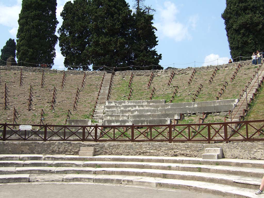VIII.7.20 Pompeii. May 2006. First, east rear entrance to the Little Theatre or Odeon with steps to upper seating.
