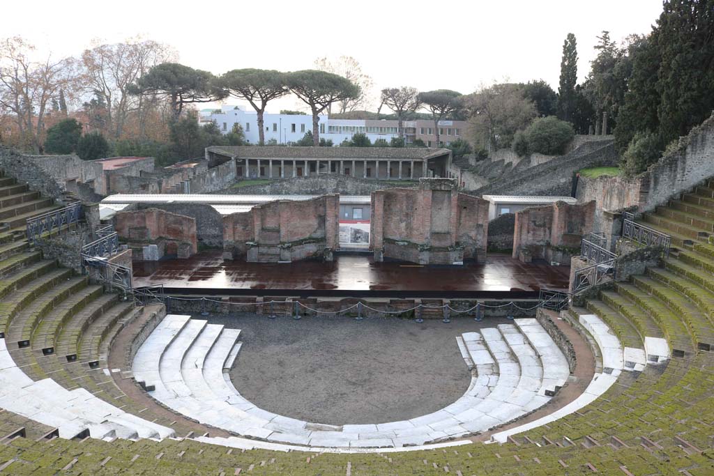 VIII.7.21 Pompeii. December 2018. 
Looking south from top of theatre, towards seating and stage area. Photo courtesy of Aude Durand.

