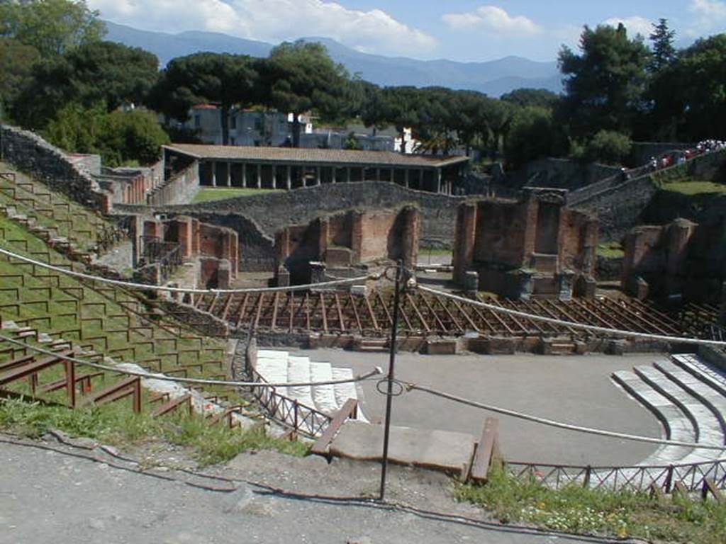 VIII.7.21 Pompeii. May 2004. View of stage from the top of the theatre.