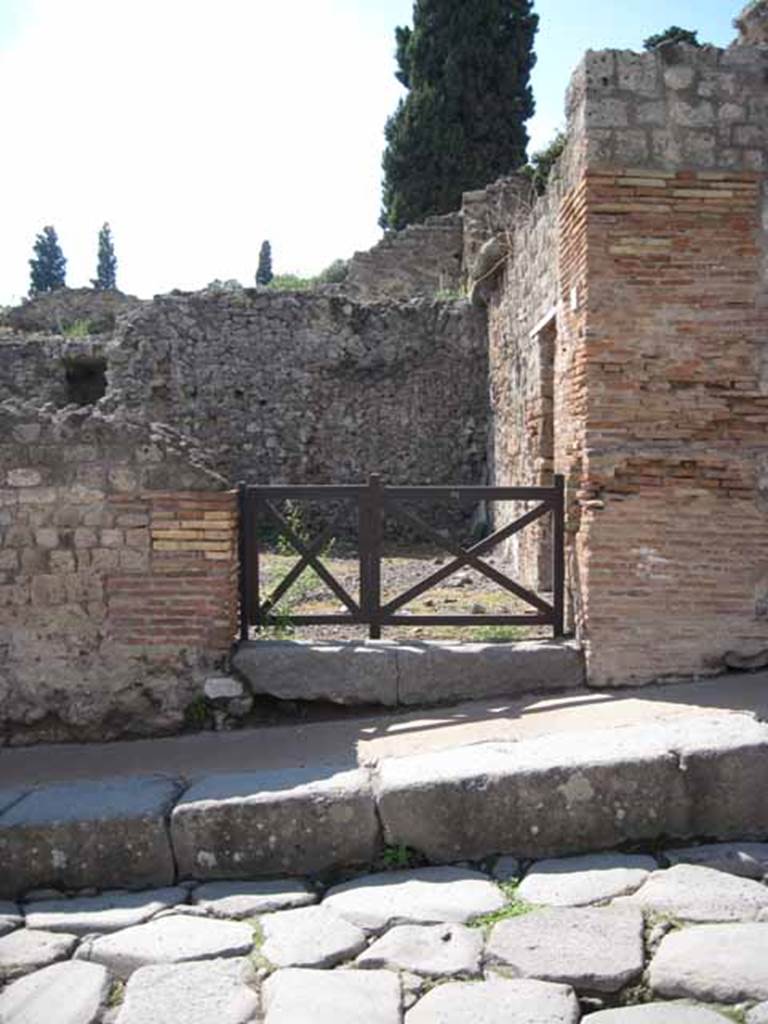 VIII.7.23 Pompeii. September 2010. Entrance, looking west from across Via Stabiana. Photo courtesy of Drew Baker.

