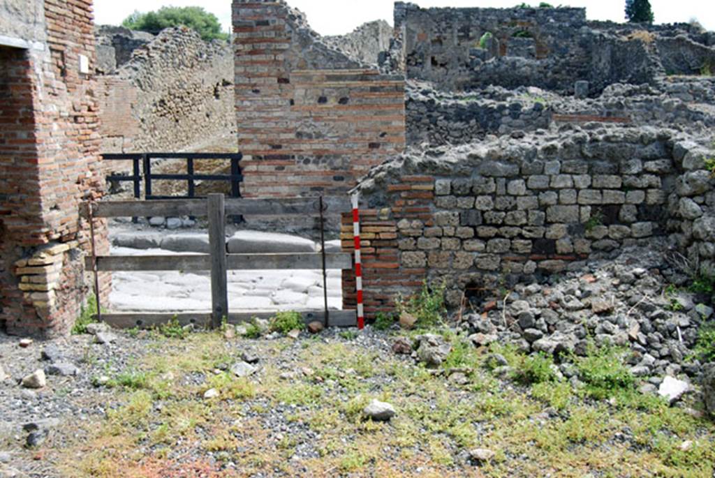 VIII.7.23 Pompeii. June 2009. East wall of entrance room, with doorway onto Via Stabiana. Photo courtesy of Sera Baker.