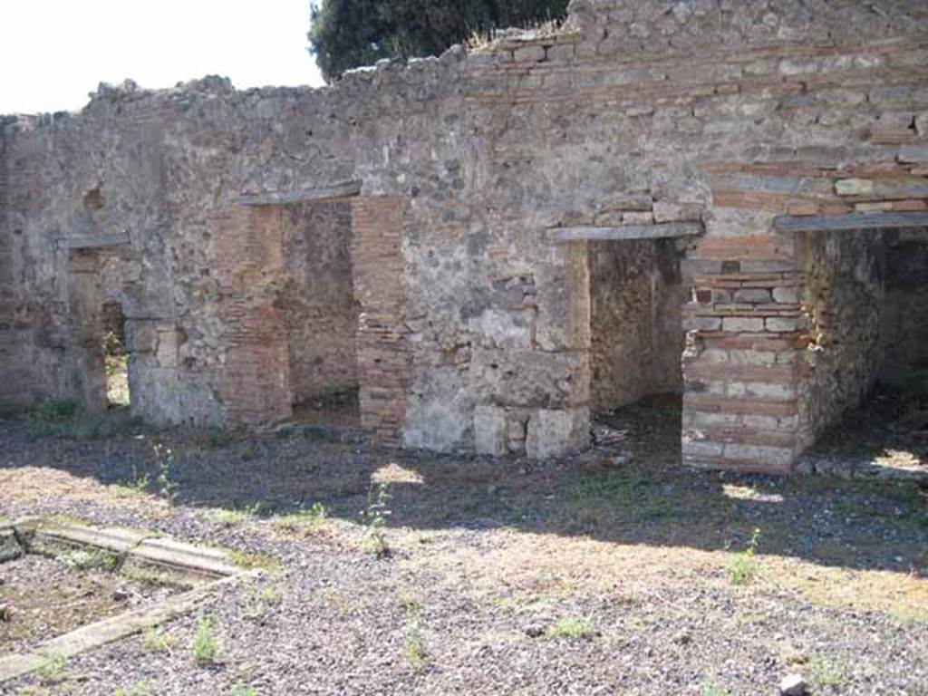 VIII.7.26 Pompeii. September 2010. West side of atrium, with doorways to four rooms, probably cubiculi. Photo courtesy of Drew Baker.
