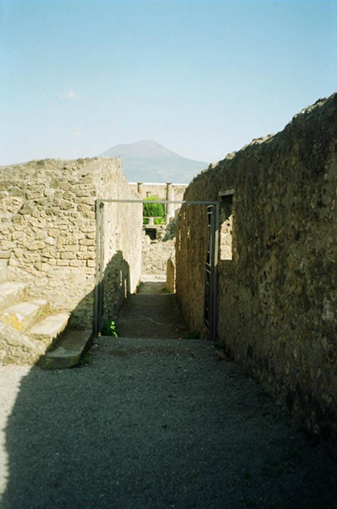VIII.7.27 Pompeii. July 2010. Looking north along passage from Large Theatre entrance.  Photo courtesy of Rick Bauer.