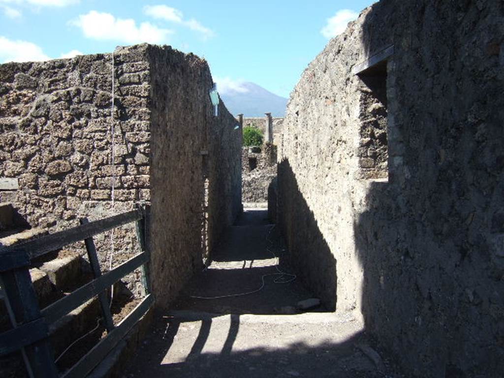 VIII.7.27 Pompeii. September 2005. Looking north along passage from Large Theatre entrance.
