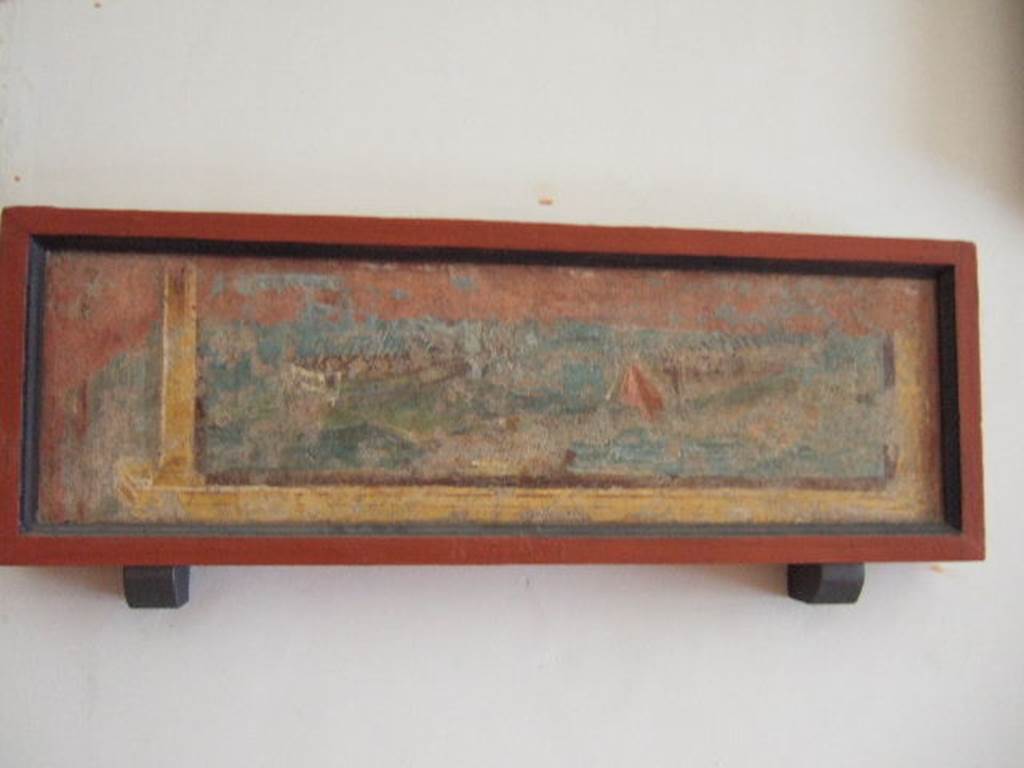 VIII.7.28 Pompeii. From east part of north portico. Naval scene. 
It was part of an architectural panel, which was left in situ, probably due to its poor condition. 
Now in Naples Archaeological Museum. Inventory number 8590.
