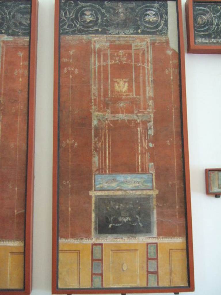VIII.7.28 Pompeii.  Panel with architectural painting and naval scene.  
Now in Naples Archaeological Museum.
