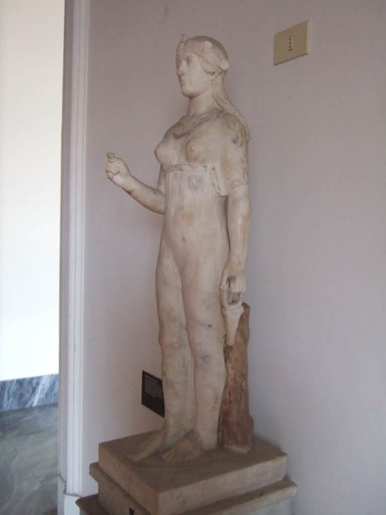 VIII.7.28 Pompeii.  Marble statue of Isis found in the north east corner of the portico. Now in Naples Archaeological Museum. Inventory number 9976.
