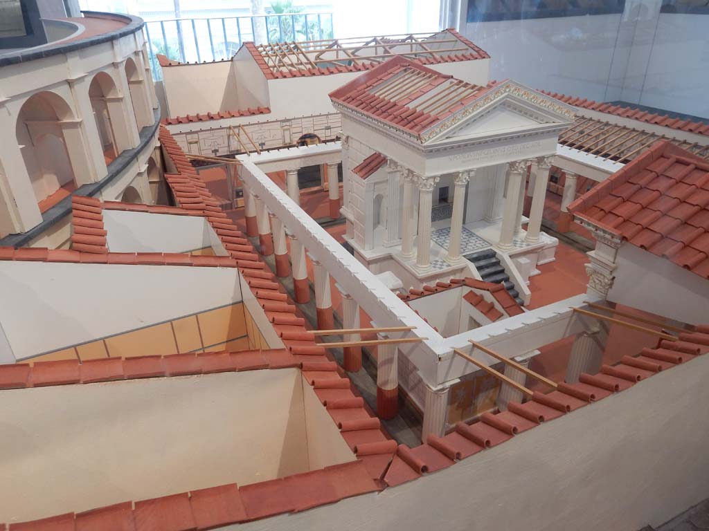 VIII.7.28 Pompeii. June 2019. Leading from the south portico, centre left in above photo, are the priest’s kitchen, dining room and bedroom.
At the top of the photo behind the west portico, would be the Ekklesiasterion.
Model now in Naples Archaeological Museum. Photo courtesy of Buzz Ferebee.


