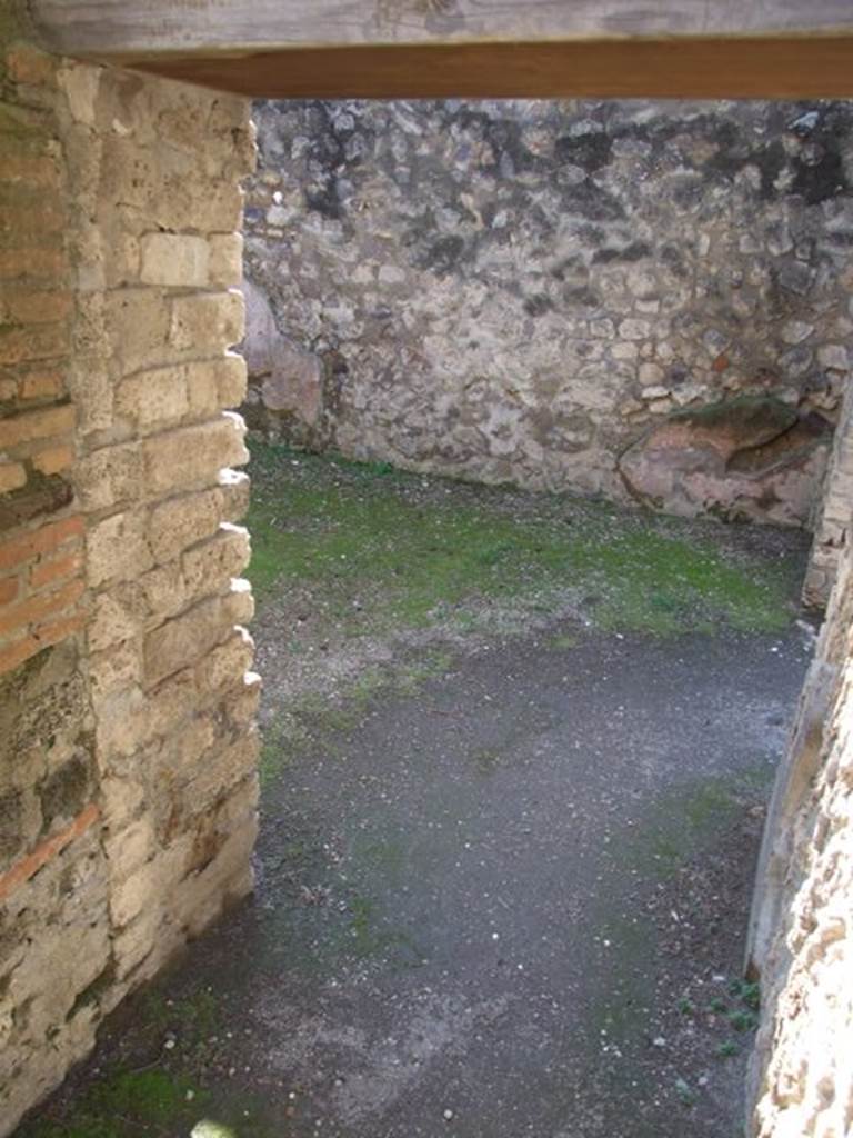 VIII.7.28 Pompeii.  March 2009. Priest’s Kitchen. Door in west wall leading to Dining room.