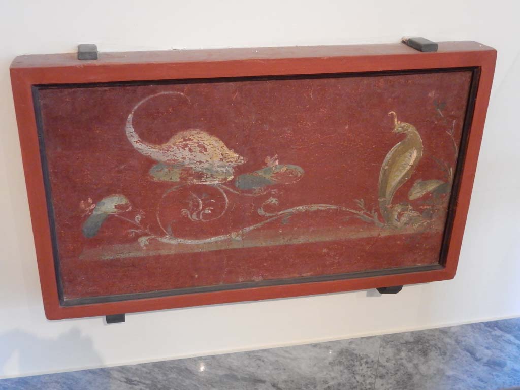 VIII.7.28 Pompeii. June 2019. Painted zoccolo panel of Egyptian mongoose and cobra, found in centre of west wall in the Ekklesiasterion. 
Now in Naples Archaeological Museum. Inventory number s. n. 3.
Photo courtesy of Buzz Ferebee.
