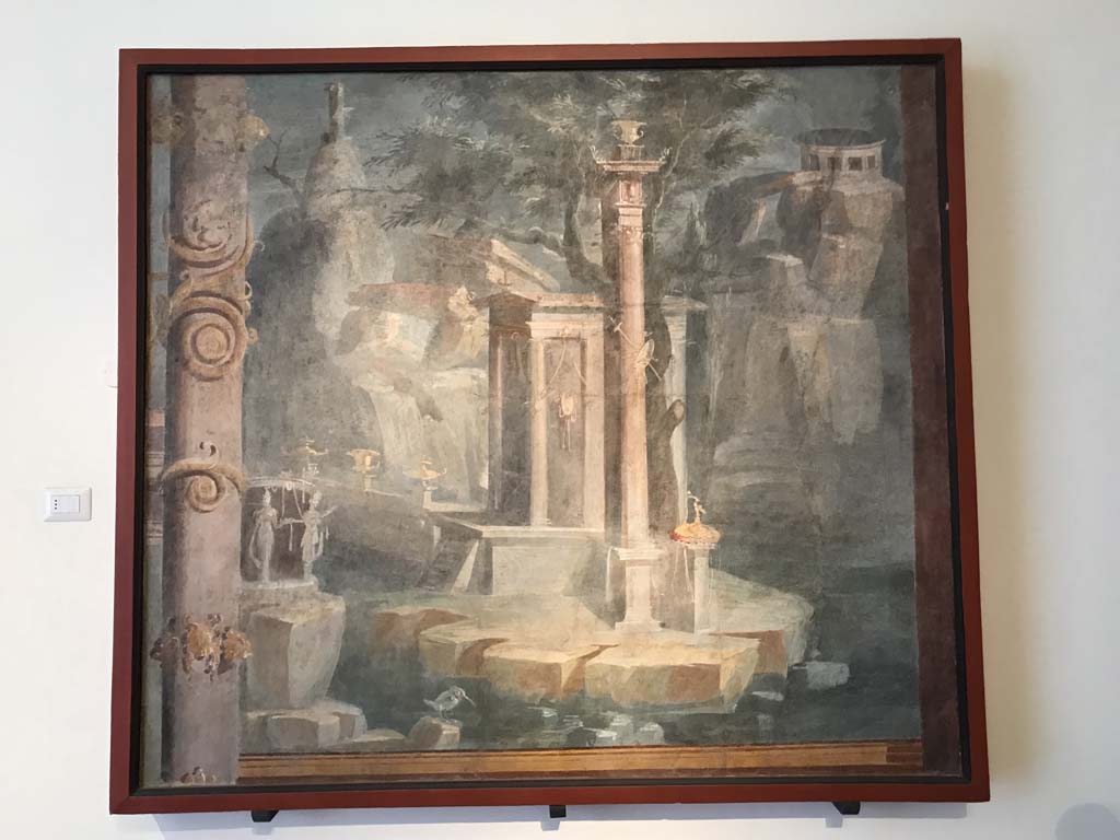 VIII.7.28 Pompeii. April 2019. Rocky landscape with little temple, sacred door and king-fisher.
Found on the right side of the north wall.  Photo courtesy of Rick Bauer. 

