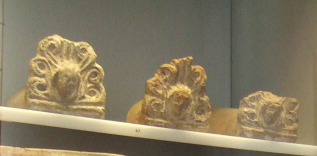 VIII.7.28 Pompeii. Antefixes with female heads, exact location unknown. Now in Naples Archaeological Museum. Inventory numbers 171548, 171549, s.n. 6.