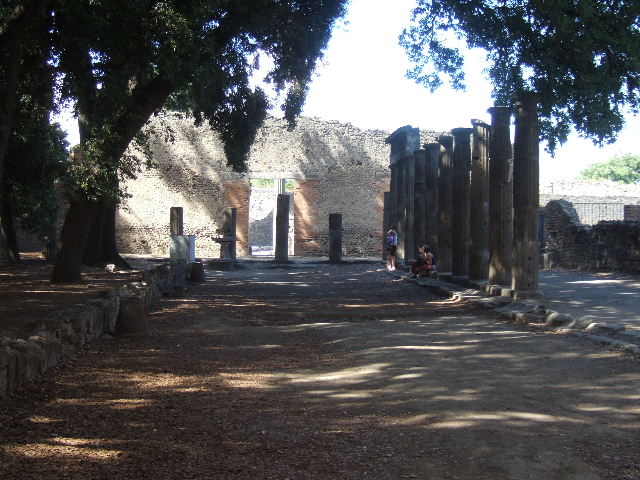 VIII.7.30 Pompeii. September 2005. Triangular Forum looking north along the east side to the entrance.