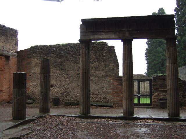 VIII.7.30 Pompeii. December 2005. Triangular Forum looking east to VIII.7.29 Samnite Palaestra.