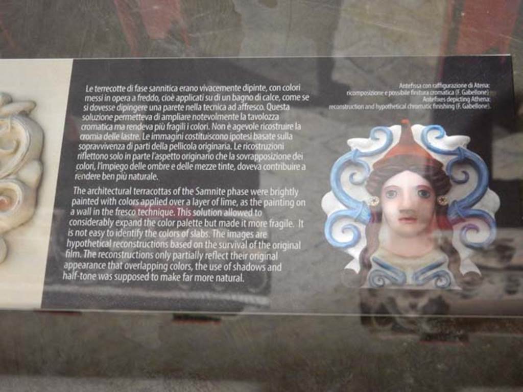 VIII.7.31 Pompeii, May 2018. Architectural terracotta’s from the Samnite phase were brightly painted.
Antiquarium information card showing hypothetical colour reconstruction based on surviving material. 
Photo courtesy of Buzz Ferebee.
