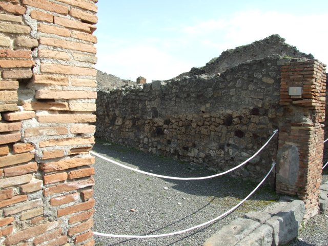 IX.1.1 Pompeii. March 2009.Entrance and south wall of shop.