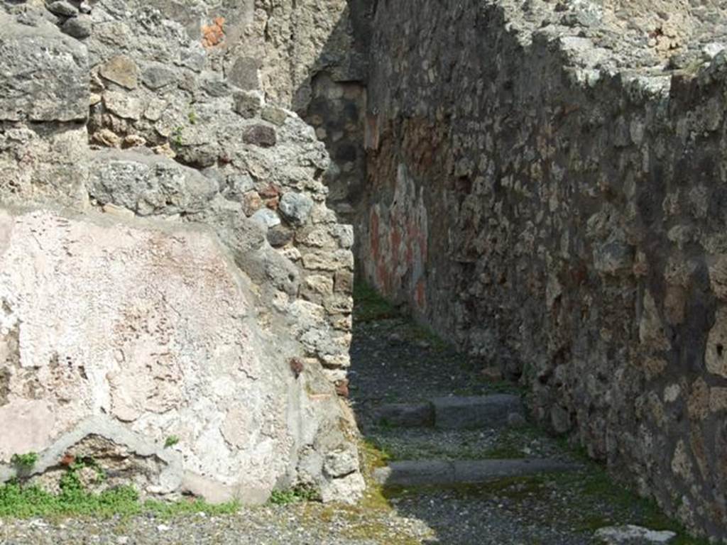 IX.1.1 Pompeii. September 2005. 
Looking north to latrine, under stairs leading to upper floor from IX.1.34.
