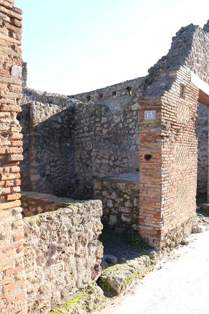 IX.1.13 Pompeii. December 2018. 
Entrance doorway and south wall and pilaster between IX.1.13 and IX.1.14. Photo courtesy of Aude Durand.

