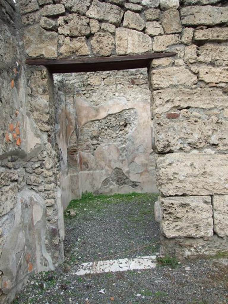 IX.1.22 Pompeii. December 2007. Doorway to room 28 on north side of second atrium, with marble threshold.