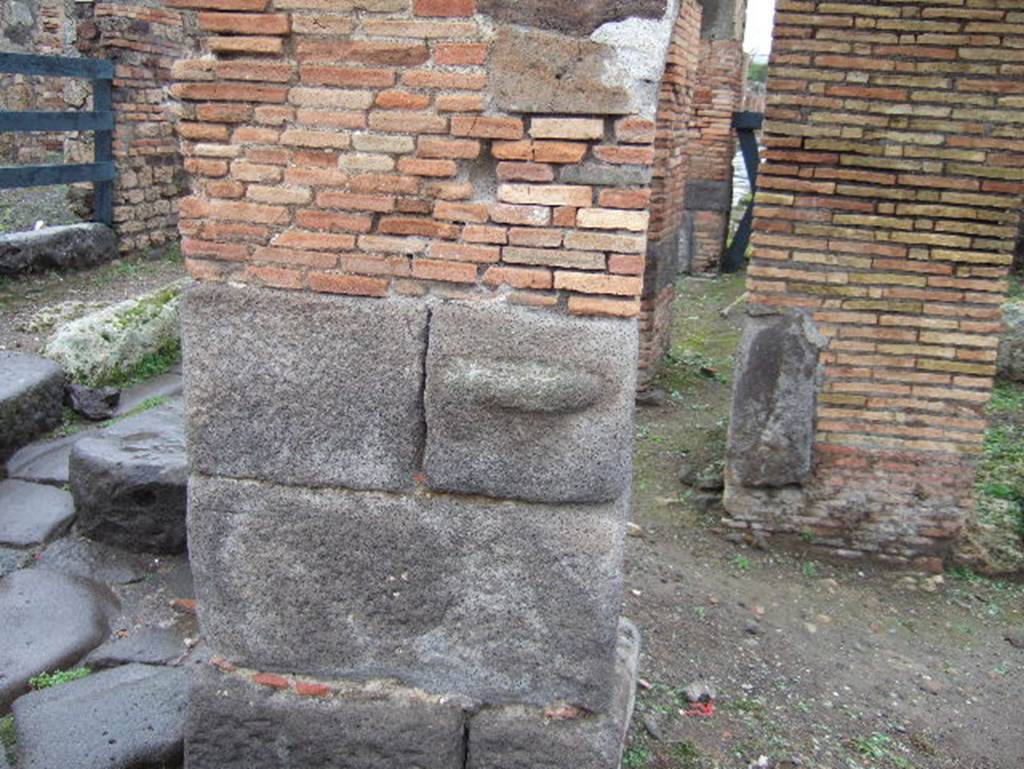 IX.2.1 Pompeii. June 2019. Phallus carved out of lava stone, on arcade pillar.
Photo courtesy of Buzz Ferebee.
