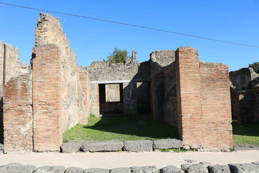 IX.2.5 Pompeii. December 2018. 
Looking east on Via Stabiana towards entrance to shop and dwelling at rear. Photo courtesy of Aude Durand.

