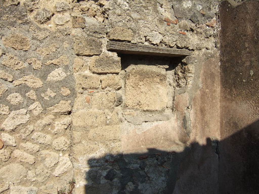 IX.2.9 Pompeii. September 2005. Niche or recess in south-east corner of rear room.
