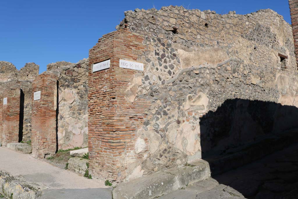 IX.2.11 and IX.2.12 Pompeii, on left. December 2018. 
Looking north at junction of Via Stabiana, on left, and Vicolo di Balbo, on right. Photo courtesy of Aude Durand.


