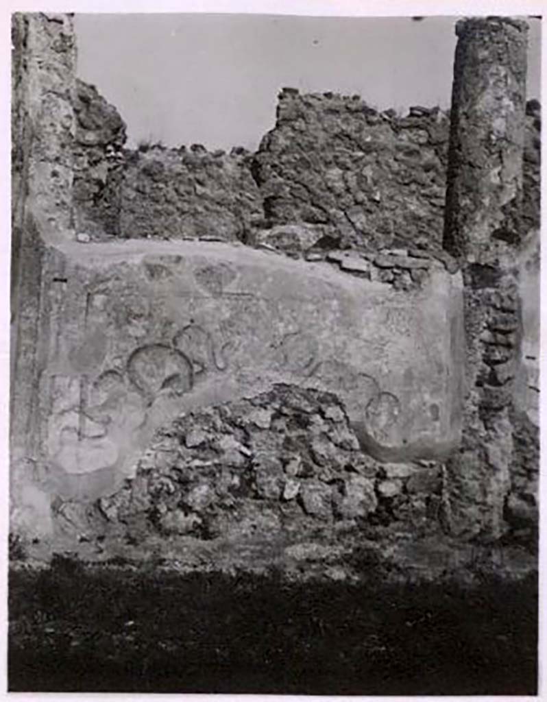 IX.2.17 Pompeii. Pre-1943. Photo by Tatiana Warscher.
Room 9, painted lararium on south side of north wall at west end of garden area.  
See Warscher, T. Codex Topographicus Pompeianus, IX.2. (1943), Swedish Institute, Rome. (no.94.), p. 174.
