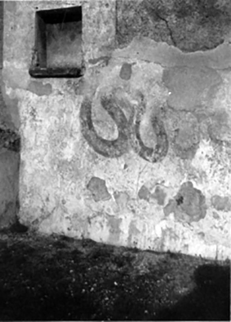 IX.2.18 Pompeii. c1930s. Room 11, garden area. Lararium on north wall of east portico. 
See Boyce G. K., 1937. Corpus of the Lararia of Pompeii. Rome: MAAR 14. (p.81 and Pl.1,4)
