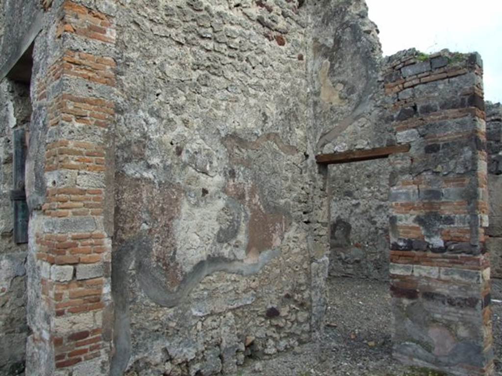 IX.2.21 Pompeii.   March 2009.  Room 6.  East wall, and side door to room 7.